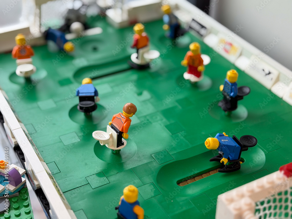 Fototapeta premium Lego minifigure foosball table scene