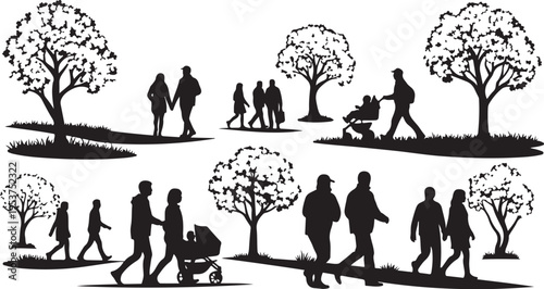 Silhouettes of people walking in a park setting