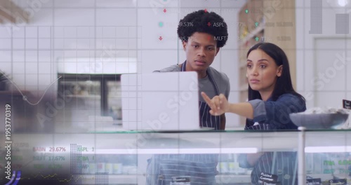 Animation of data processing over diverse waiter and waitress discussing over a laptop at a cafe