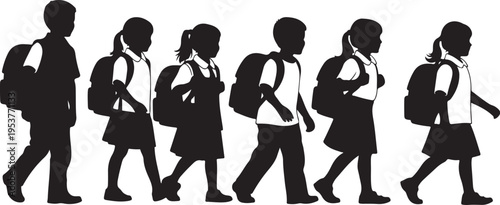 Silhouettes of school children walking in a line together