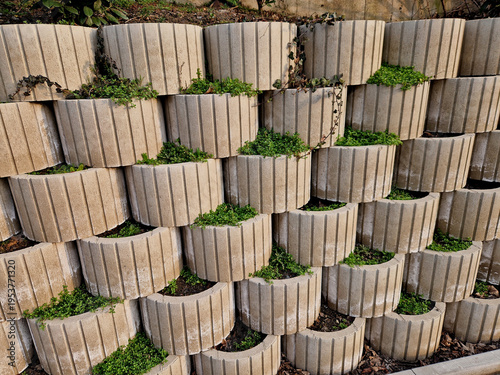 Bild auf Leinwand hollow concrete retaining wall system, often referred to as plantable living retaining wall blocks