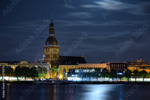 Riverside night view of cathedral in Riga