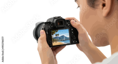 Photographer capturing stunning beach scene with palm trees and mountains