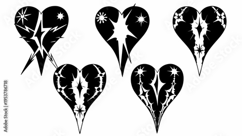 A set of black and white heart shaped icons with cracks and stars
