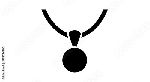 Black pendant on a necklace.