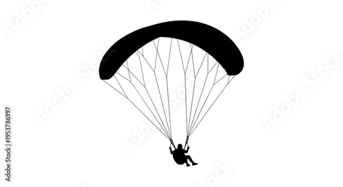Person paragliding in the air.