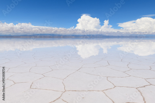Peaceful landscape of salar de uyuni salt flat in bolivia with sky reflection