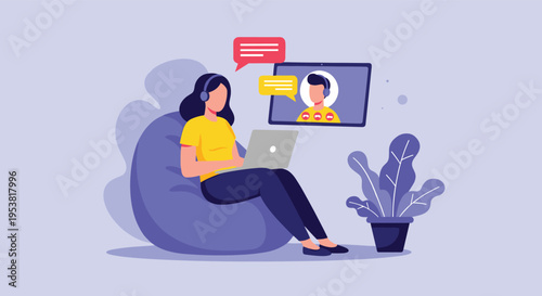 Woman sitting on a beanbag chair using her laptop for a video call with a remote colleague during a work session.
