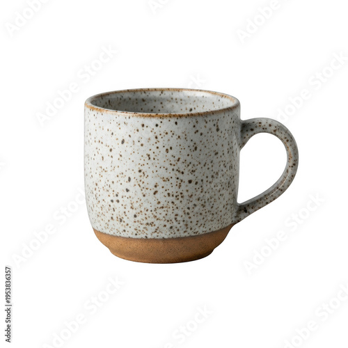 A speckled white and brown ceramic mug with a handle on a white background
