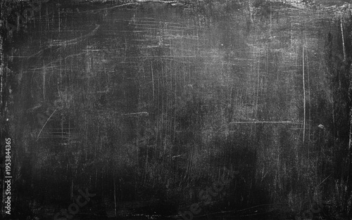 Chalk rubbed out on blackboard background. often with faint chalk smudges, used for educational.