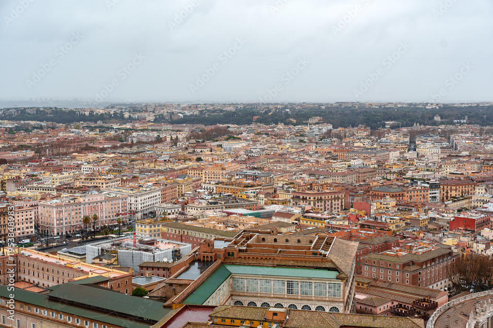 Obraz premium View of Rome with buildings and streets under cloudy sky during winter season