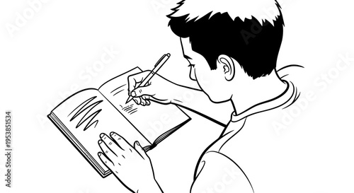 boy writing in book