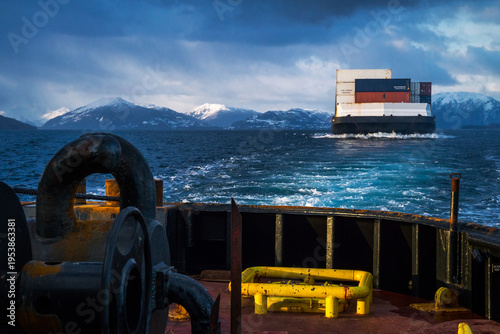 Tug boat and barge traveling north to Alaska