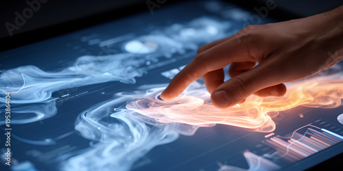 Close-up of hand touching luminous interactive screen with data