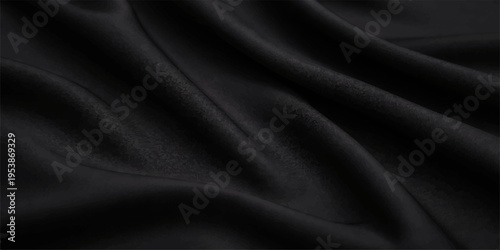 Luxurious black satin fabric with a smooth shiny texture creates an elegant dark silk backdrop featuring soft drapery waves for a high-fashion textile background