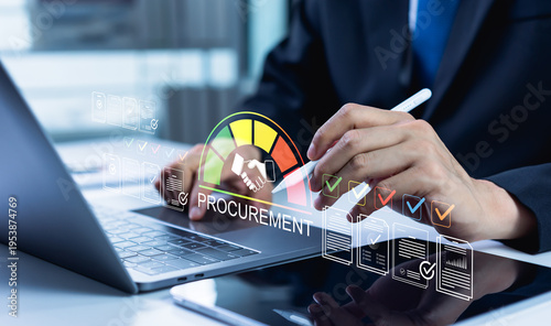 Businessman manages a digital procurement process on a laptop and tablet, reviewing a supplier approval dashboard to streamline purchasing decisions and improve supply chain efficiency.