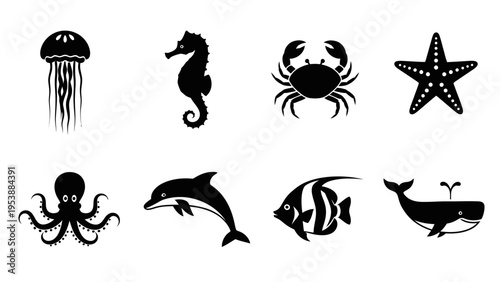 Set of marine life silhouettes: jellyfish, seahorse, crab, starfish, octopus, dolphin, fish, whale