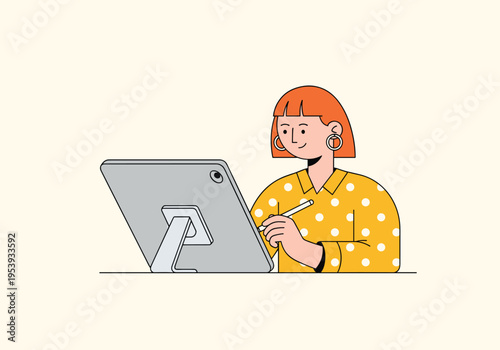 Woman drawing on a tablet with a stylus