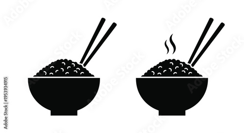 Two bowls of rice with chopsticks steaming in a stark silhouette