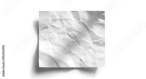 Crumpled white paper texture with soft shadow on minimal background