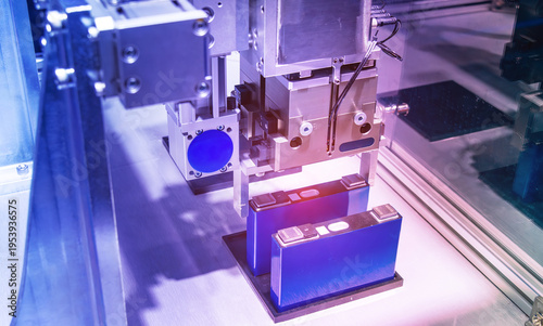 Advanced Industrial Robot Arms Assemble EV Battery Pack on Automated Production Line in Modern Electric lithium battery Smart Factory.