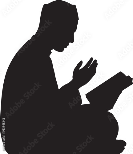 Silhouette of a person in prayer with an open book beside them