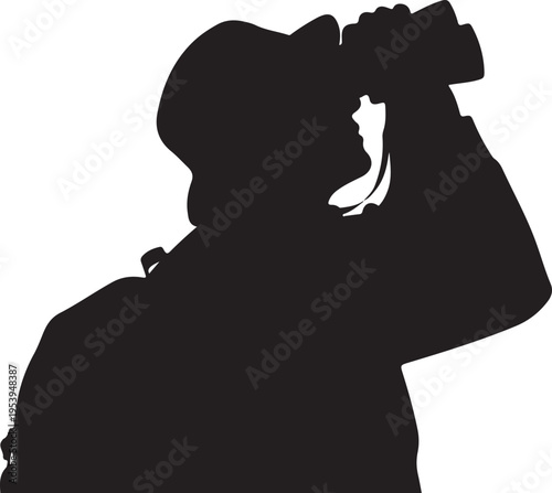 Person using binoculars to observe the distant scenery or wildlife.