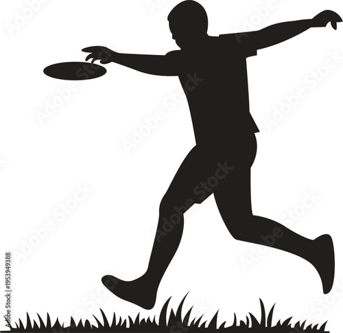 Silhouette of a man throwing a frisbee in a grassy field