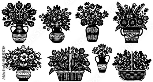 Beautiful black and white floral arrangements in decorative pots and baskets