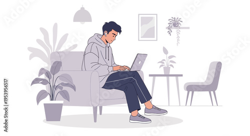 Young man working on laptop while relaxing on sofa in modern living room
