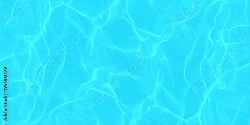 Blue water surface with bright sunlight reflections and ripples in swimming pool or tropical ocean