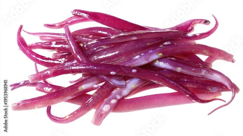 Pile of vibrant, pickled red onion, showcasing texture and hue