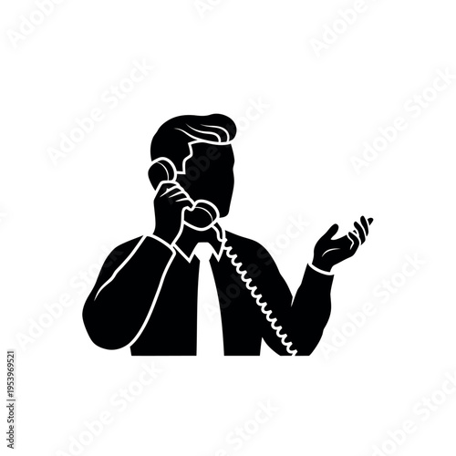 Silhouette of a man talking on a landline phone.
