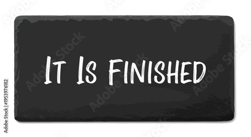 It Is Finished text on a black slate background, representing completion, accomplishment, and the end of a task or project.