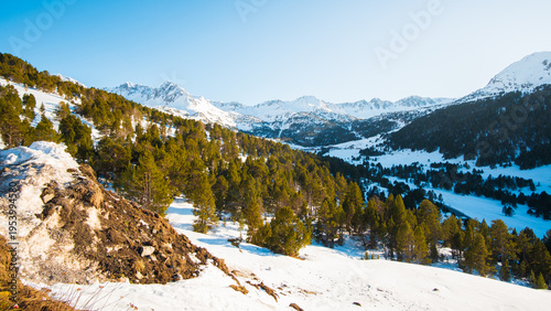 Winter Sunset Landscape in Andorra with Snow-Capped Mountains