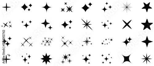 Collection of black starburst shapes and sparkles on white background