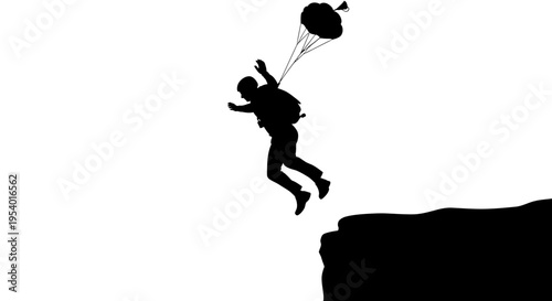 Silhouette of a Base Jumper Leaping from a Cliff