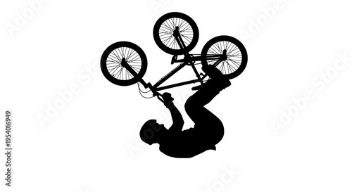 Silhouette of a BMX Rider Performing an Aerial Backflip Stunt