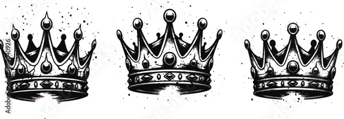 Three ornate crowns with intricate details and patterns