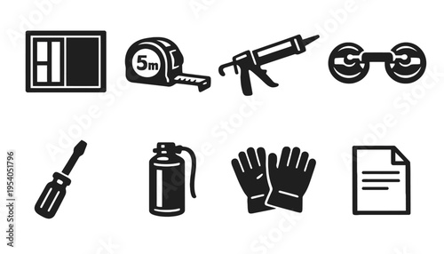 A set of construction tools and equipment in black silhouette icons