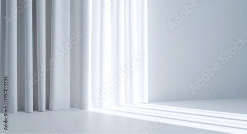 Bright white room with sunlight streaming through sheer curtains and onto floor