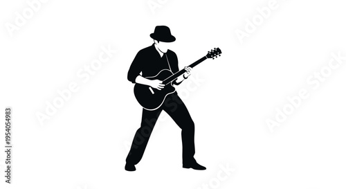 Silhouette of a man playing an acoustic guitar while wearing a hat