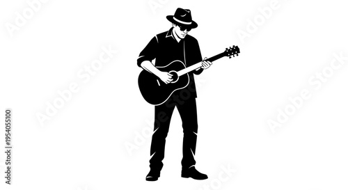 Man playing acoustic guitar while wearing a hat and dark sunglasses