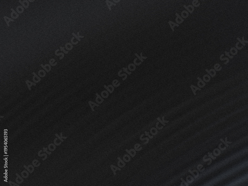 A close-up view of a black fabric surface