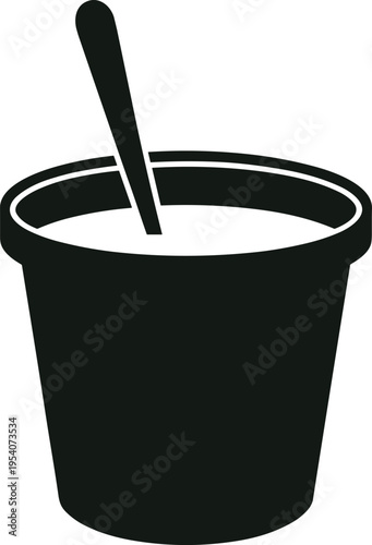 Black cup filled with whipped cream and topped with a spoon