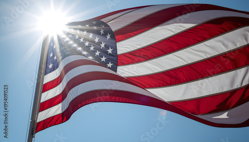 Close-up waving American flag sunlight