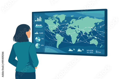 Woman analyzing global data on a large digital display screen.