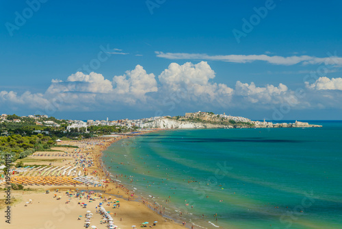 Crowded Vieste beach on Adriatic Sea during summer, Apulia
