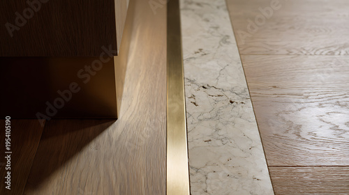 Abstract View of Modern Interior Design Elements: Wood Floor, Marble Accent, and Brass Detail with Geometric Shadow and Warm Lighting