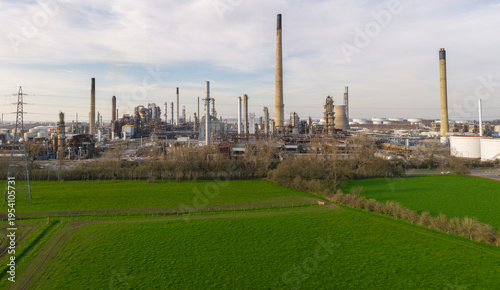 Stanlow Oil Refinery Industrial Site and Green Fields, England, UK